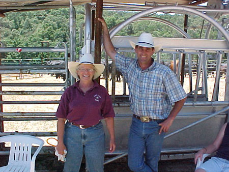 David Foss and Coco Collelmo work the squeeze chute